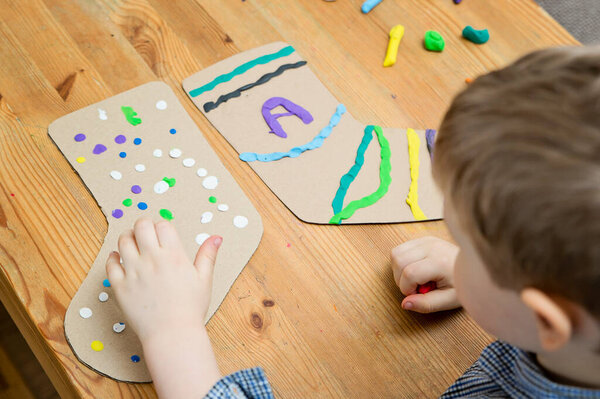 Artwork for World Down Syndrome Day. Children made paper sock as support and compassion symbol.