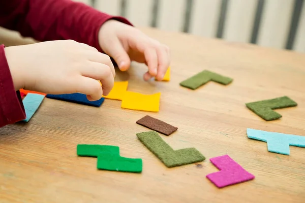 Matching the shapes. Logic game for brain activity training. Children home activity. Early education, fine motoric skills. Primary school exercises.