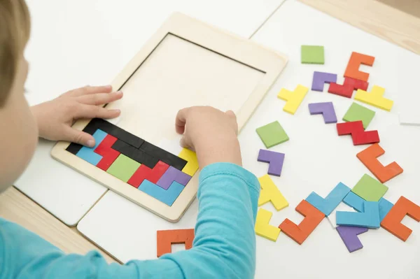 Wooden puzzle. Intelligent, brain training game. For Kids to get smarter by improving abilities, using this toy to learn Colors and give mind boost with this fun logical memory game.