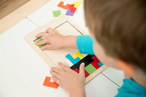 Wooden puzzle. Intelligent, brain training game. For Kids to get smarter by improving abilities, using this toy to learn Colors and give mind boost with this fun logical memory game.