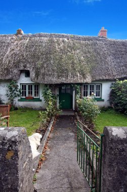 Irish traditional cottage house of Adare clipart
