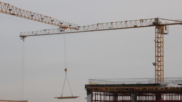 Lifting construction crane. construction site — Stock Video