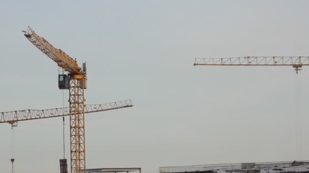 Lifting construction crane. construction site — Stock Video