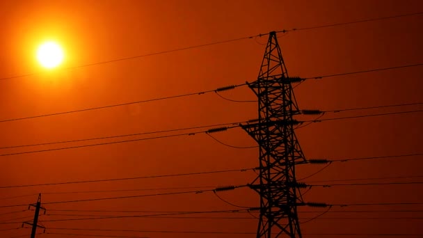 High voltage towers at sunset — Stock Video