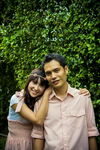 Lovely couple hug in the garden2 — Stock Photo, Image