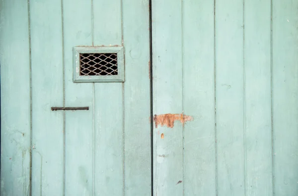 Verde velha porta de madeira — Fotografia de Stock