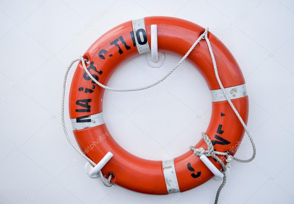 Life vest on white wall