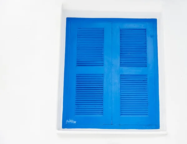 Closed blue window with white wall1 — Stock Photo, Image