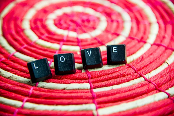 Love word on red circle mat4 — Stock Photo, Image