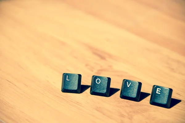 Love word on the laminate floor7 — Stock Photo, Image