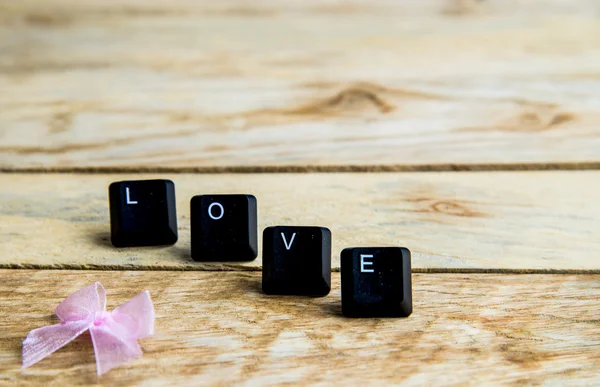 Love word on the wooden floor5 — Stock Photo, Image