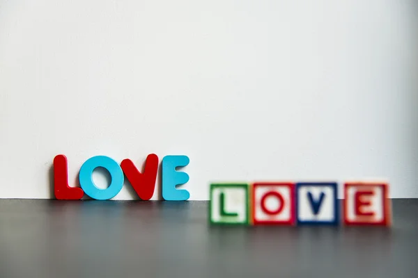 Colorful wooden word Love with white background4 — Stock Photo, Image