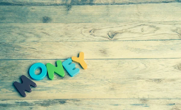 Colorful wooden word Money on wooden floor2 — Stock Photo, Image