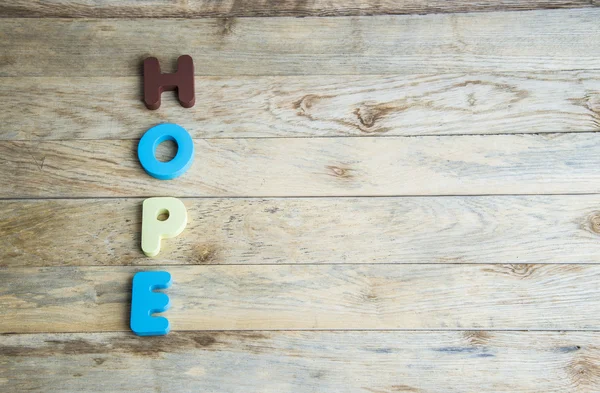 Colorful wooden word Hope on wooden floor3 — Stock Photo, Image