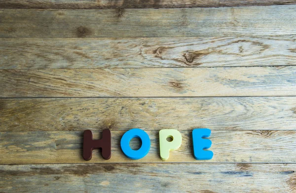 Красочное деревянное слово Hope on wooden floor4 — стоковое фото
