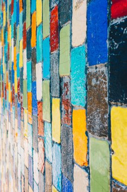 Vertical perspective view of abstract colorful square bricks wall decorate outdoor with creative background concept idea