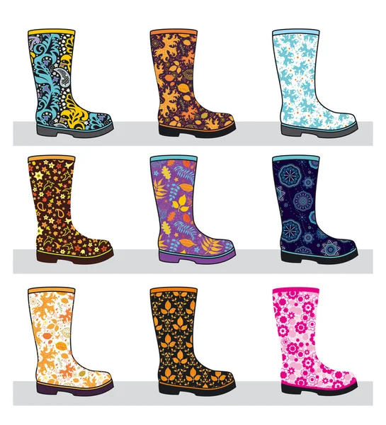 Set of colorful rubber boots — Stock Vector