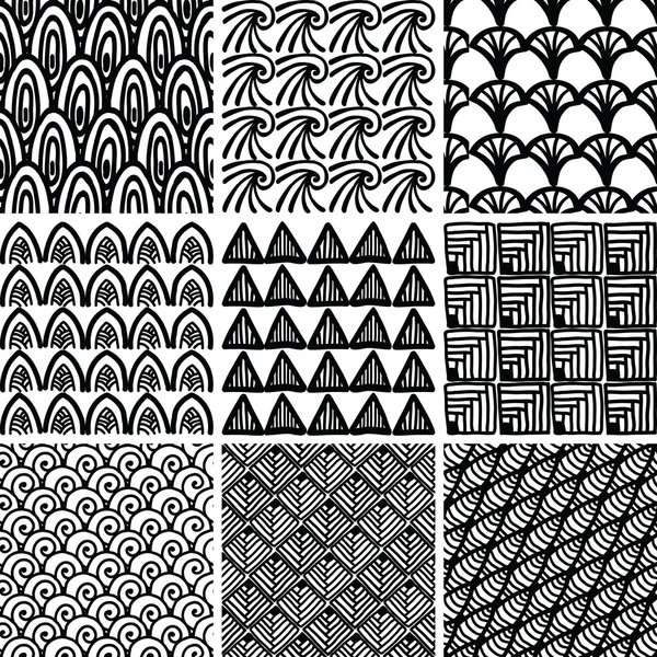 Set of doodle seamless patterns and textures — Stock Vector