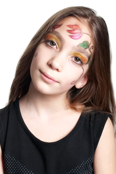 Flicka klädd ansikte måla make-up — Stockfoto