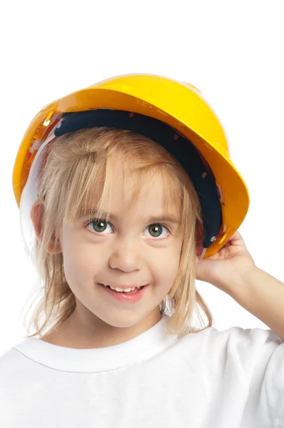 Petite fille portant un casque jaune — Photo