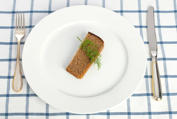 Diet concept (bread and dill on the plate) — Stock Photo, Image