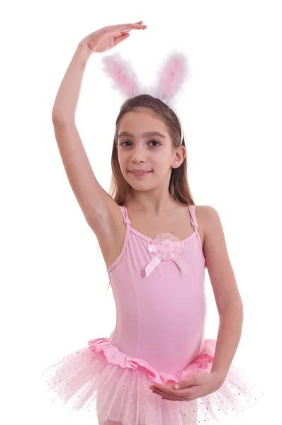 Flickan bär bunny öron på vit Royaltyfria Stockfoton