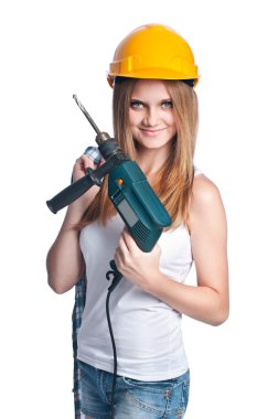 Sarı baret takmış matkap ile kız
