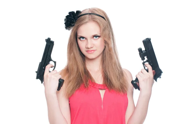 Beautiful girl holding two guns isolated on white — Stock Photo, Image