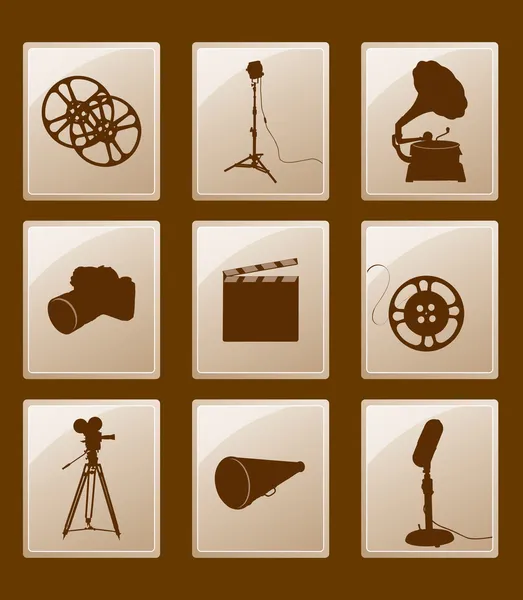 Set of icons with retro silhouettes; gramophone, reflector, film — Stock Vector