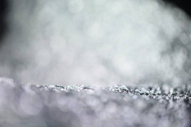 Gümüş parıltı ışık dokusu. Noel soyut arkaplanı.