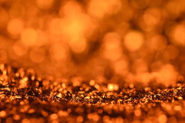 Turuncu parıltılı ışık dokusu. Soyut Noel arkaplanı.