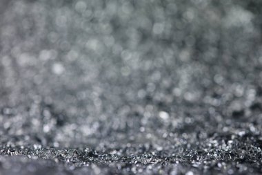 Gümüş parıltı ışık dokusu. Noel soyut arkaplanı.