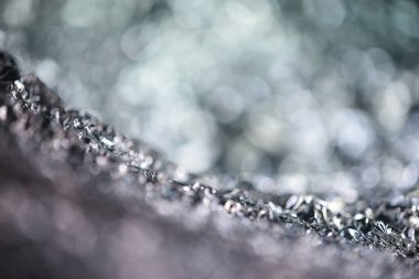 Gümüş parıltı ışık dokusu. Soyut Noel arkaplanı.