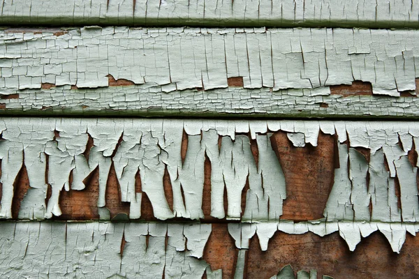 Antiguo lado de madera pintada — Foto de Stock