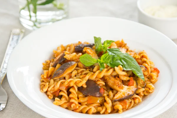 Fusilli with mushroom in tomato sauce — Stock Photo, Image