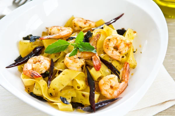 Tagliatelle with prawn and chili — Stock Photo, Image