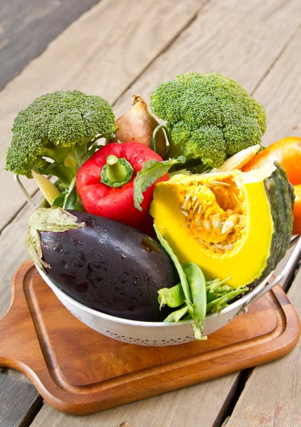 Varieties of vegetable in colander — Stock Photo, Image