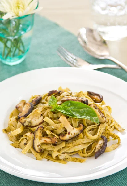 Fettuccine and mushroom with pesto — Stock Photo, Image