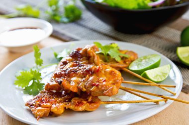 Grilled chicken with chili sauce clipart