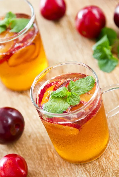 Plum juice with soda — Stock Photo, Image