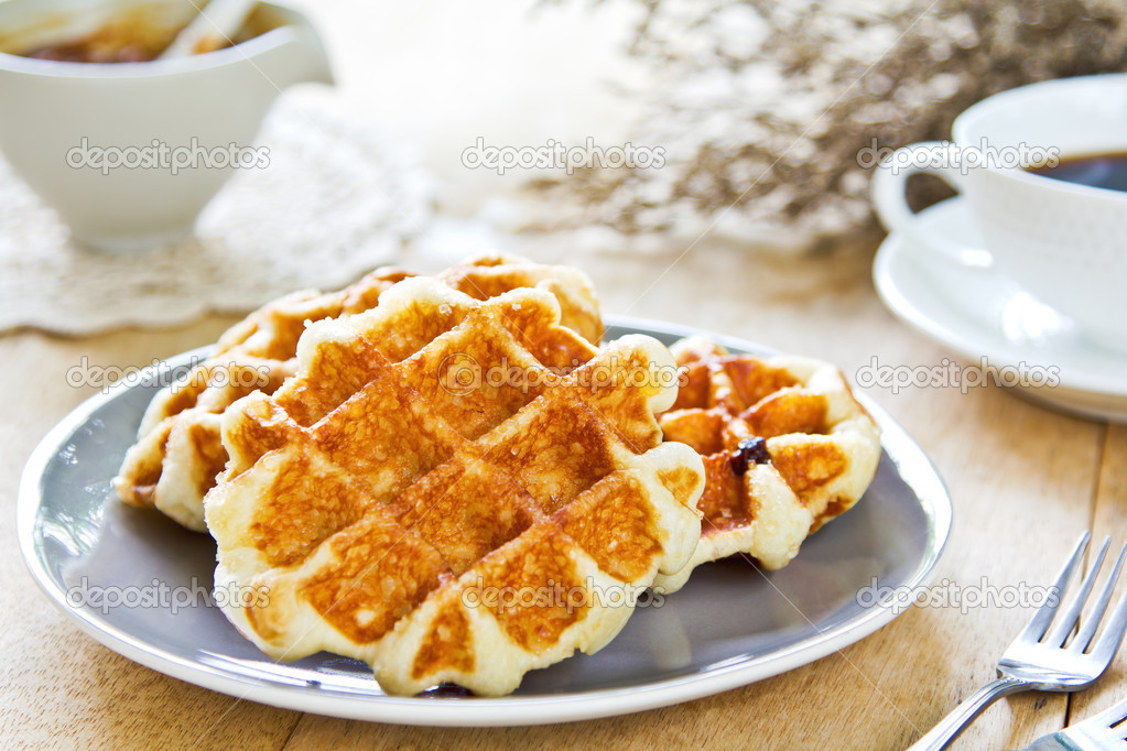 Waffle by Caramel sauce and coffee