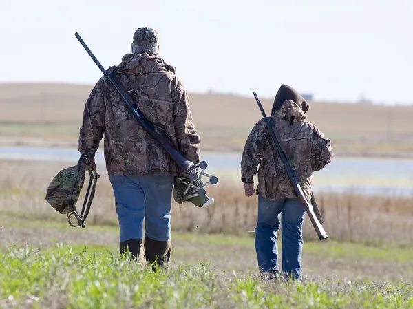 Father and son hunting — Stock Photo, Image