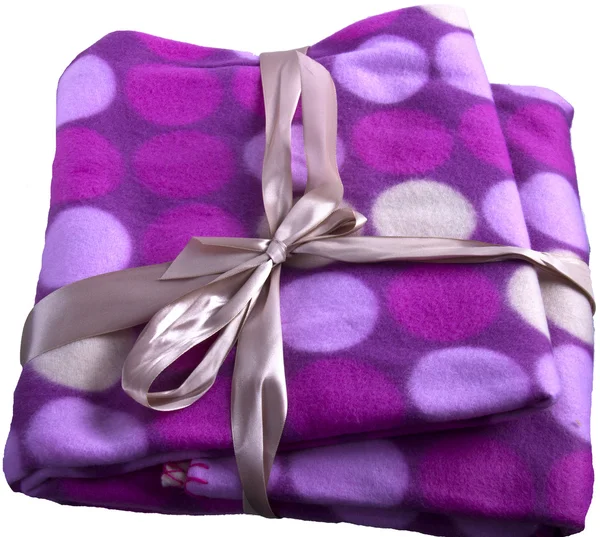 Plaid cashmere blanket colored gift wrap flying colorful circles — Stock Photo, Image