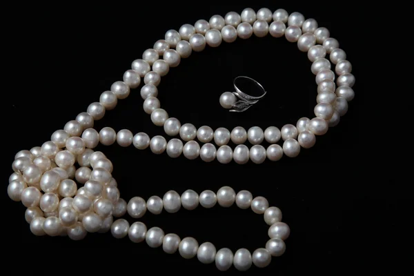 Large white pearl beads necklace with pearl ring — Stock Photo, Image