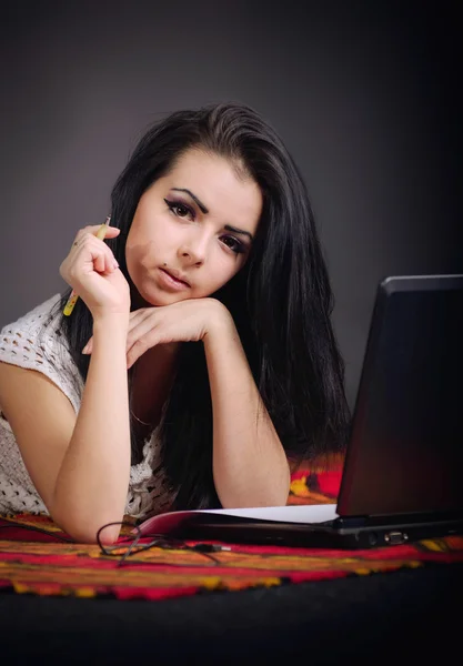 Girl with a computer — Stock Photo, Image