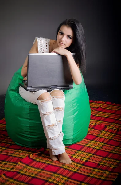 Girl on green pufe — Stock Photo, Image