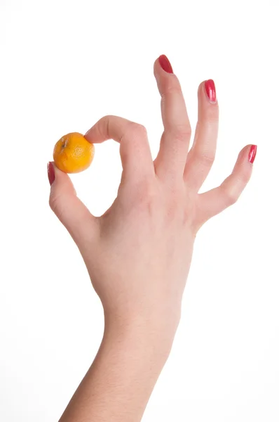 Mandarine wenig in der Hand — Stockfoto