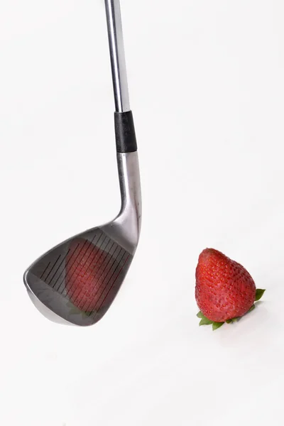 Golf and strawberries — Stockfoto