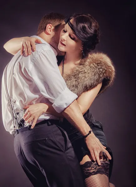 Dancing couple with arms, passion, danger — Stock Photo, Image