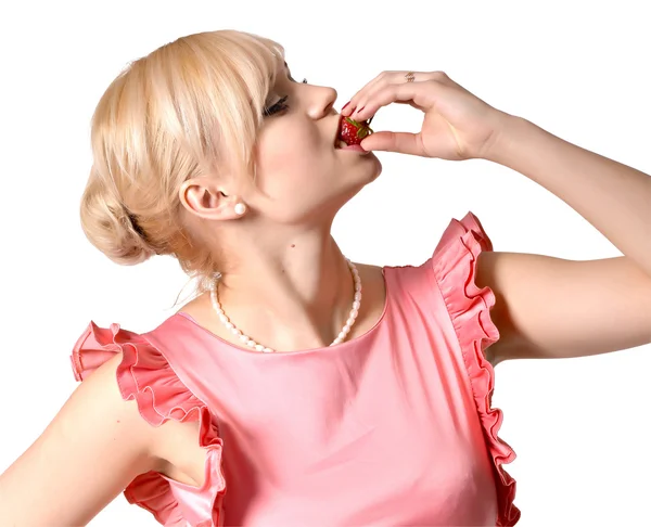 Girl eating strawberry — Stock Photo, Image